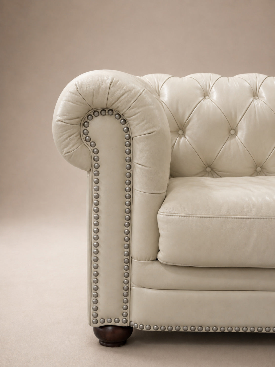 IVORY LEATHER CHESTERFIELD SECTIONAL
