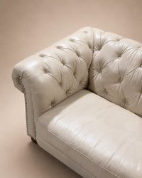 IVORY LEATHER CHESTERFIELD SECTIONAL